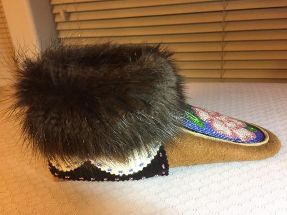 Slipper made with moosehide and stroud.