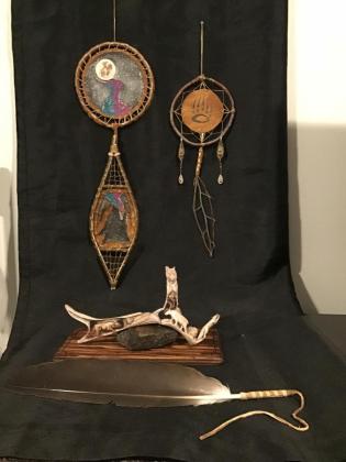 Caribou horn carving five animals 