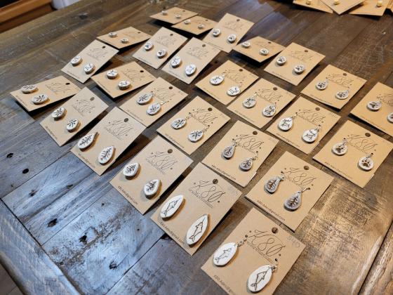 Caribou antler disc earrings; hand cut, sanded and burn-etched