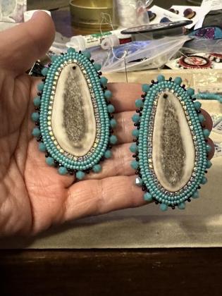 Caribou antler, backed with smoke tanned moose hide earrings