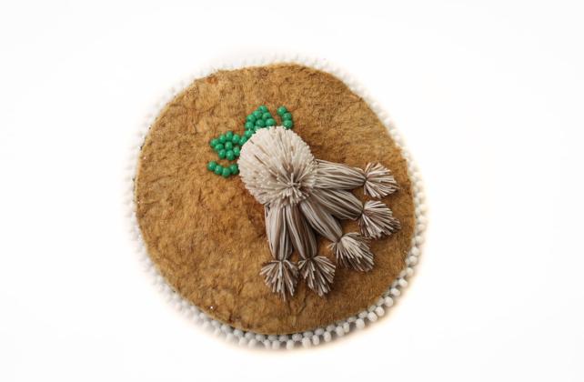 Tufted moosehide brooch