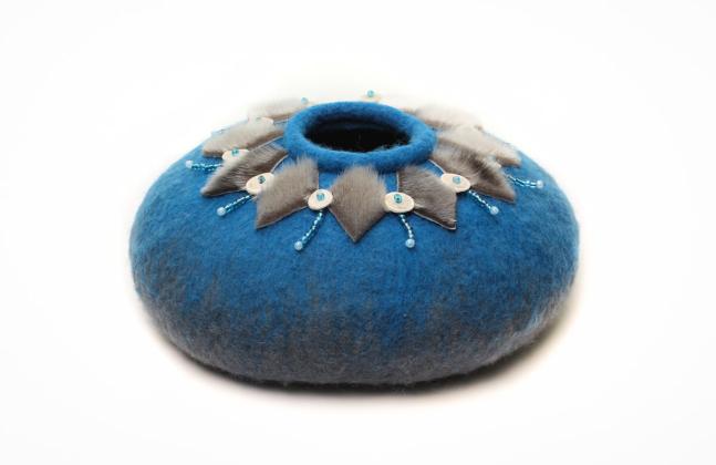 Felted vessel with sealskin accents