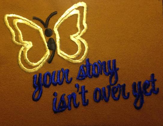 hand embroidered piece that was framed to recognize Suicide Prevention Day