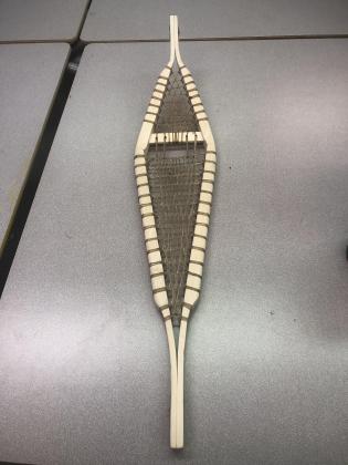 Miniature snowshoe with sinew webbing