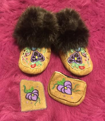 Beaded set with home tanned caribou hide