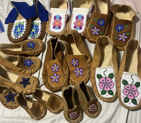 Unfinished moccasins on moosehide 