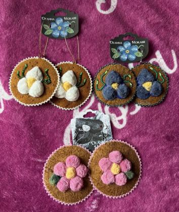 Beaded earrings caribou hair tufting 