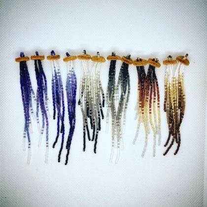 Metallic fringe with moosehide